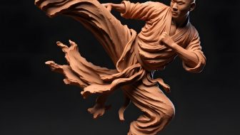 Sculpture of a man in a martial arts pose